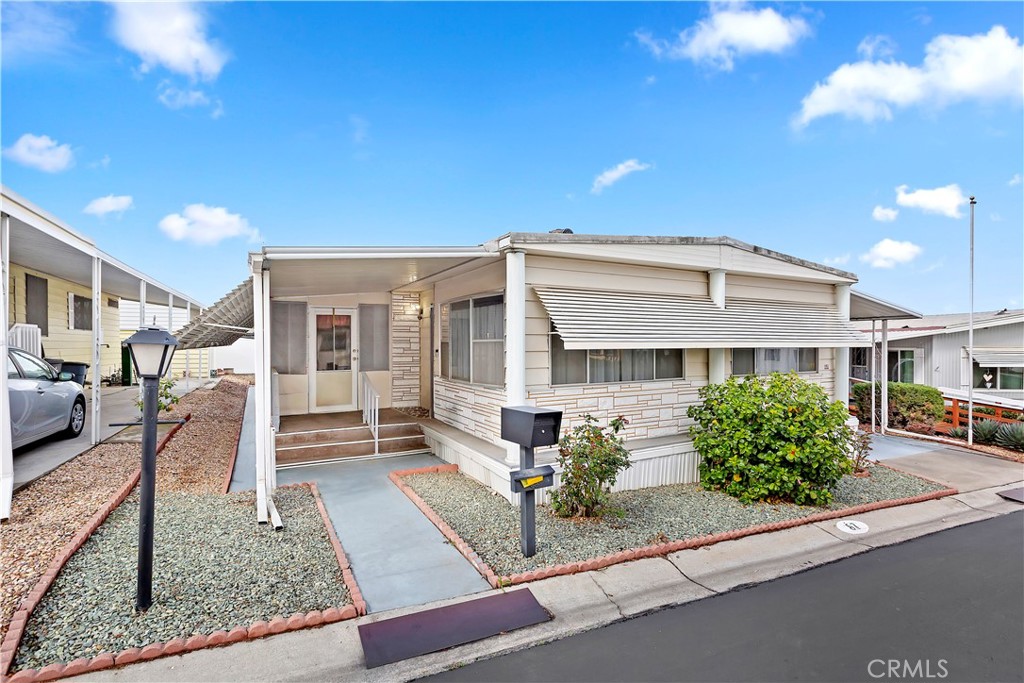 ***BACK ON THE MARKET -- ACT FAST!!! Buyer was unable to perform through no fault of the property.*** Nestled in Villa Magnolia, a gated 55+ community in Riverside, this charming home offers a spacious and functional layout designed for comfort and convenience. Featuring 2 bedrooms and 2 bathrooms, the home has a bright and airy living room that seamlessly flows into the dining area. The beautifully remodeled kitchen is a standout, featuring an oversized island with a gas cooktop, built-in oven, and dishwasher—perfect for cooking and entertaining. With ample counter space and cabinetry, it’s designed for both style and practicality. Just off the kitchen, an additional flex room can be used as a cozy family room, breakfast nook, or home office. Another separate room behind the kitchen offers even more versatility—ideal for an office, craft space, or extra storage. Beyond the home, Villa Magnolia offers a welcoming and active community lifestyle. Enjoy the clubhouse with a fireplace lounge, fitness center, billiards room, and a full kitchen, plus a pool, spa, and social events that make it easy to connect with neighbors. Conveniently located near freeways, Kaiser Permanente, shopping centers, and Tyler Mall, everything you need is just minutes away.