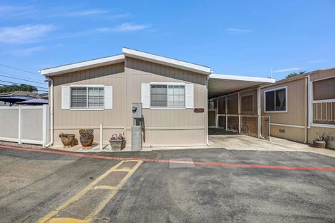 Photo of 9041 El Dorado Pkwy PKWY #52, El Cajon, CA 92021 (MLS # 260023007SD)
