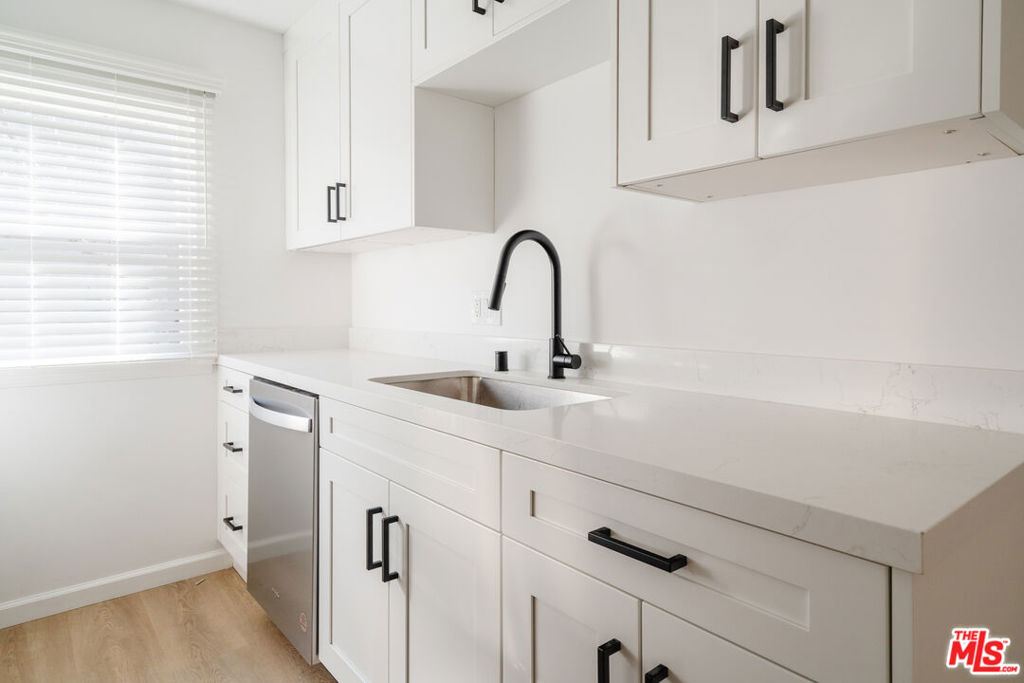 Stylishly remodeled 1 Bed-1 Bath unit in prime West Hollywood, just above Sunset Plaza. Fresh off an extensive renovation, this pristine home features all new wood flooring, modern kitchen cabinetry, stainless steel appliances, quartz countertops, an updated bathroom, large private terrace and includes parking and separate storage. The apartment features a well-proportioned layout with a spacious living room and decorative fireplace, separate dining/breakfast area, generous closet space and abundant natural light. The living room opens directly onto the covered private terrace, a perfect space for entertaining or enjoying the California indoor-outdoor lifestyle. Set within a boutique residential complex on a tree-lined street above the Sunset Strip, this home offers both style and convenience in one of LA's most central locations.