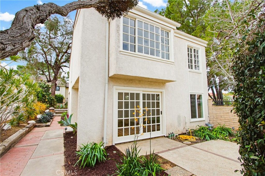 Photo of 48 Willow Tree Lane, Irvine, CA 92612 (MLS # OC26053462)