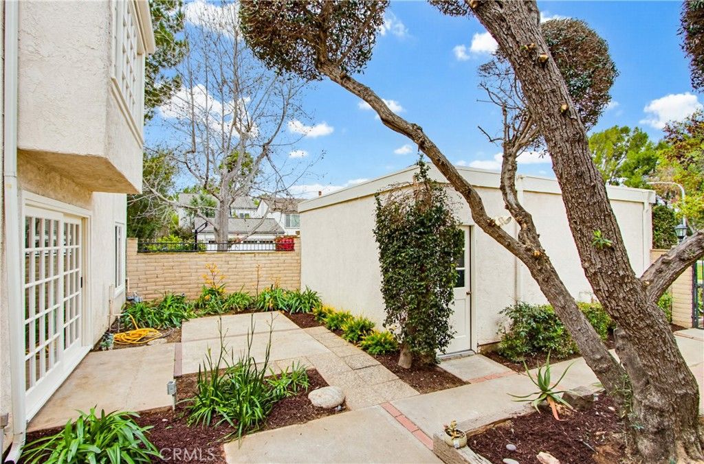 Photo of 48 Willow Tree Lane, Irvine, CA 92612 (MLS # OC26053462)