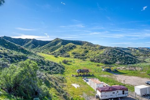 Photo of 15000 Baker Canyon Road, Canyon Country, CA 91390 (MLS # SR25221123)