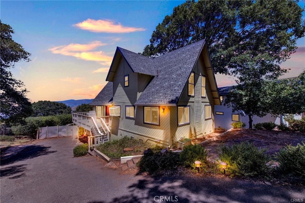Beautiful A frame lakeview home in Riviera Heights. Open living room and kitchen area with amazing views of the lake from downstairs as well as the upstairs loft style bedroom. The tall lake facing windows maximize the natural light for a large, open, and airy feeling. There are 2 bedrooms and bath downstairs with a large soaking tub, and another bedroom and bath upstairs with an amazing view of the lake, making this home perfect for all types of living/vacation home situations. The kitchen features newer stainless appliances along with a large pantry. There is a wood burning stove that heats the entire home during the winter months, saving money on utilities, as well as a brand new central heat and air unit and 3 year old roof. The spiral staircase leading from the lower deck to the upper deck area adds to the outside charm. This home is truly turn key and ready for new owners. Come take a look and see for yourself, it will not disappoint!!