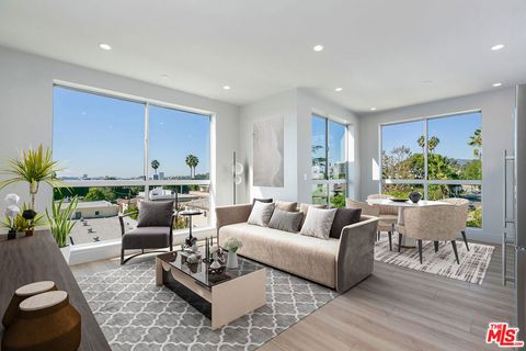 Photo of 12431 Rochester Avenue #206, Los Angeles, CA 90025 (MLS # 25613015) Photo of 12431 Rochester Avenue #206, Los Angeles, CA 90025 (MLS # 25613015)