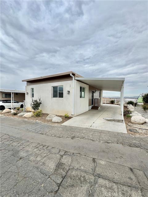 Photo of 1134 Villa Calimesa LN #12, Calimesa, CA 92320 (MLS # IV26164541)