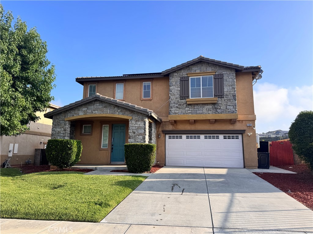 THIS HOME FEATURES 3 BED, 3 BATH WITH 2 CAR ATTACHED GARAGE