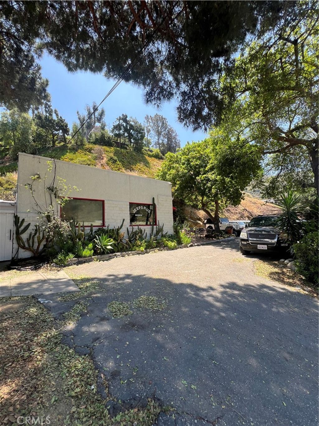 Photo of 3225 Laguna Canyon Road Rd, Laguna Beach, CA 92651 (MLS # NP25132157)