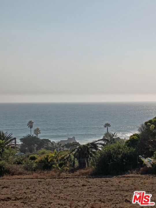 Ocean views!! Walk across to beach access by county line surfer's dream. Private free standing primary bedroom with open living room and gigantic balcony with views! One car garage, laundry, plenty of storage and closet space. Enjoy wood burning fireplace. Best location next to all beaches on West end of Malibu Easy to show. Extra parking. Available September 1 2025.