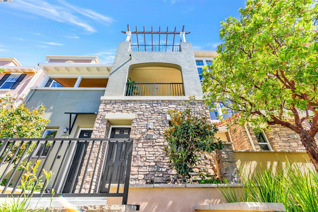 Epitome of Luxury Living! Welcome to this rarely available, resort-style condo in Amalfi at Sorrento, Dublin Ranch, with panoramic view! This home features 2 bedrooms, 2.5 bathrooms, and 1,630 sq. ft. of bright and open living space. Primary bedroom boasts a huge balcony where you can enjoy the expansive view, along with a spacious en-suite bathroom. The second bedroom can be used as an office or a second primary suite, complete with a walk-in closet and an adjacent full bath. Both bedrooms feature high vaulted ceilings. Kitchen includes an oversized island and breakfast bar that opens to the living and dining areas—perfect for easy entertaining. This unit is upgraded throughout with Brazilian Cherry engineered hardwood flooring, extra wide baseboards and window/door trims, GE Profile kitchen appliances, upgraded lighting and bathroom fixtures, and more. Located across the street from the beautiful clubhouse, which includes an outdoor pool and hot tub, fitness room, and party room. Close to major freeways, award winning schools, and shopping. Must come see it to fully experience this beautiful home!