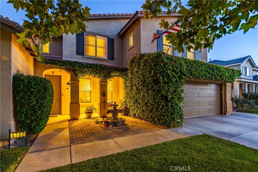 ***LIVE BEAUTIFULLY*** Tucked away on a quiet cul-de-sac in West Lancaster, this beautifully upgraded two-story home offers five bedrooms, three bathrooms, and nearly 3,400 square feet of living space. With impressive curb appeal and thoughtful details throughout, this property combines comfort, style, and functionality in every corner. Inside, plantation shutters adorn every window, while upgraded lighting enhances the home’s warm and inviting atmosphere. The downstairs features newer carpet just one year old, and the spacious layout includes both formal and casual living areas. The kitchen has been recently remodeled with sleek quartz countertops, a new stove and microwave, double ovens, and abundant cabinetry—making it a true chef’s delight. Upstairs, the expansive primary suite is a retreat of its own, showcasing crown moldings, built-ins, and a luxurious feel. Secondary bedrooms feature built-in desks, and a large upstairs laundry room adds convenience for busy households. An open loft provides additional living space, perfect for a game room, office, or lounge area. The backyard is designed for both relaxation and privacy, with a covered patio, fruit trees, an expansive lawn, and a cement dog run. Extra parking in the front and a rare four-car tandem garage ensure plenty of space for vehicles, storage, and hobbies. Freshly painted shutters and trim, along with well-maintained landscaping, complete the home’s polished exterior. Offering generous storage throughout and a blend of modern upgrades and timeless finishes, this West Lancaster gem is the perfect home for those seeking space, style, and convenience in a highly desirable location.