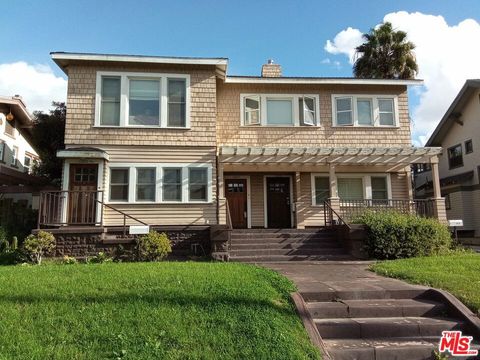 Photo of 1220 3rd Avenue, Los Angeles, CA 90019 (MLS # 25631149)