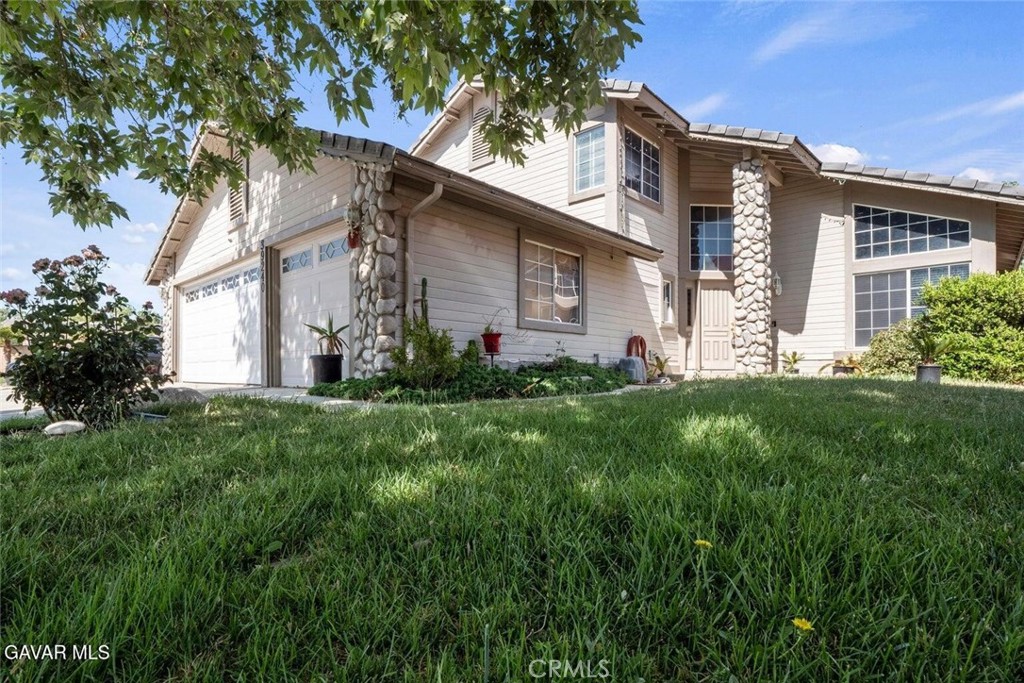 Beautiful 2 story home in the West Palmdale. offer 4 bedrooms 3 full bathrooms. Open plan floor. Family room has a cozy fireplace. The formal living rooms, all bedrooms upstairs and hall has laminate flooring, for your convenience this house offers a downstairs bedroom and a full bathroom. The kitchen has granite counter tops with a nice back splash, and stainless-steel appliances refrigerator will stay. The master suite has a dual sink, walk-in closet. and a nice and relaxing balcony to enjoy in the mornings your cup of coffee or in the evening a cup of wine. Big back yard with a cover patio and a big tree to enjoy a carne asada with your family and friends. Also, in the back yard there is a store shed 8x10. 3 car garage. RV access. Near to Highland Hight school. Cotton elementary, Palmdale Regional Medical Center, shopping center, Mary Kerr Park, Restaurants, Palmdale Mall and 5 minutes from the Freeway 14.