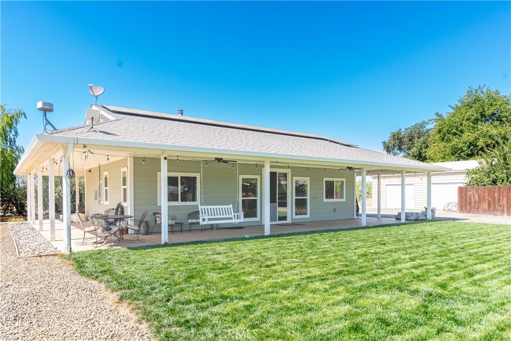Welcome to this picture-perfect farmhouse built in 2019 nestled in a peaceful rural community within the highly sought after Durham Unified School District and close to Chico, CA. This 1.2 acre property offers the perfect blend of country charm and modern convenience, featuring owned solar, a water softener, mini split, on demand water heater and an open floor plan ideal for entertaining. The spacious kitchen boasts stainless steel appliances, abundant counter space, custom cabinetry and granite counter tops. The primary suite is a true retreat with a walk in closet and a luxurious walk in double head steam shower. Step outside and enjoy a lifestyle that is as beautiful as it is functional. The property includes a new horse/animal barn, a detached two bay shop/garage, RV parking, a wraparound porch and an amazing chicken coop fit for royalty. The lush grounds are irrigated and showcase a vibrant fruit orchard, large raised garden beds…the fruit orchard includes plum, pomegranate, two types of peach trees, grapes, apples, fig, olive, grapefruit and apricot. The famous on-site Farm Stand offers income potential and is ready for your next venture. Check out the pictures…this unique set up is a money maker. Whether you are looking for a hobby farm, a home-based business opportunity, or simply a peaceful rural lifestyle, this property has it all.