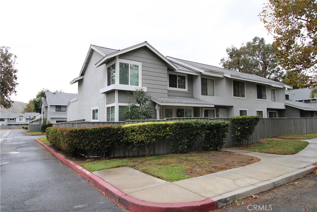 Two-Story 2-Bedroom Condo in North San Bernardino! Living Room with a Fireplace, New Interior Paint, and Newer Energy-Efficient Windows.There is Carpet, Tile, and Vinyl Plank Flooring througbhout the home. The Kitchen features Newer Countertops, Sink, and Faucets, and a Stove/Oven (gas). Dishwasher, and Garbage Disposal. Washer/Dryer Hookups (garage) and Central AC/Heat are also included. Two Bedrooms and Bathrooms are Upstairs, and a Half Bath Downstairs. Attached 2-car Garage, Fenced Yard, and HOA Pool/Spa. Nice enclosed Front Porch, and plenty of Visitor Parking in this Mountain Park HOA Community. Close to Cal State San Bernardino and local High School, Elementary, and Middle Schools. Also near the San Bernardino Sherriff's Academy. Water, Trash, Sewer, and HOA Dues included. No Pets Please.