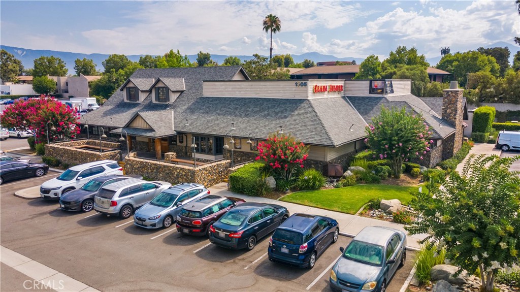 10,663 Freestanding Restaurant with a 76,230sf/1.75ac lot and high-traffic frontage on Hospitality Lane is available as a 3rd Generation opportunity for a turnkey entry. Currently operating as a Claim Jumper Steakhouse & Bar, known for Classic American dining (lunch/dinner). The property was first occupied by another beloved restaurant, Bobby McGee's, creating a legacy of dining excellence for well over 30 years. Tastefully designed with rustic elegance, the restaurant showcases soaring exposed ceilings, ambient lighting, natural stone walls, and rich wood-finishes. The space exudes both warmth and sophistication - ideal for chef-driven or upscale dining concepts. Wood fire pizza oven & rotisserie station with bar seating and refrigerated built-ins designed for elevated culinary production and guest engagement. Large custom bar with upgraded finishes complete with display cabinets, built-in refrigeration, wells, extended service bar, recessed lighting, television wired and sound system. A cozy niche bar dining room area compliments the space with a featured stone accent wall gas fireplace and ample seating. Perfect for happy hour or live music & entertainment. Seating capacity - 450 with spacious dining room areas, tables and booth seating. Expansive kitchen, fully equipped with multiple hoods, fire suppression, walk-in coolers, freezers, dry storage, keg cooler, dry cellar, restroom, sinks, prep area and private office. Welcoming front outdoor patio with two large seating areas for waiting guests. High visibility, major retail trade area hub, 105-parking spaces, monument & building signage and is an adjacent outparcel to new Staybridge Suites 106-room hotel. Located next door to Black Angus and less than 1-mile to La Quinta Inn, Doubletree, Red Lobster, Olive Garden, El Torito, Outback Steakhouse, IHOP, Costco, Best Buy, Ojos Locos under-construction, SB County and Tri City Corporate Offices. Further Retail exists in the immediate Trade Area providing a large amount of retail synergy. Conveniently located off the I-10 Freeway at Waterman exit. Must verify own Zoning & Use with City of San Bernardino.