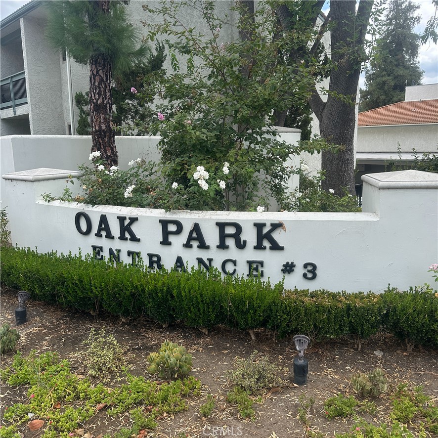 Welcome to this beautiful location in Calabasas , first-floor condo in the highly desirable Oak Park Calabasas community. Freshly painted throughout and featuring newer laminate flooring, this home offers a modern and inviting feel. Both bathrooms are equipped with brand-new vanities, and the kitchen has been beautifully remodeled with custom cabinetry and stunning granite counter tops. A double stainless-steel sink and ample storage space make it both functional and stylish. The dining area boasts built-in cabinetry, while the spacious living room includes a sliding glass door that opens to a large patio, offering serene views of mature oak trees and a lush greenbelt. Recessed lighting with dimmer switches sets the perfect ambiance throughout. The master bathroom features a tiled shower, and the master bedroom includes a walk-in closet for added convenience. Inside the unit, you'll also find a washer and dryer conveniently tucked in a closet for easy access. The community has recently undergone significant upgrades, including new doors, signage, mailboxes, lighting, roofs, windows, and security cameras. Security guards are on-site for peace of mind, and there is a dedicated storage unit in the carport. On-site property management ensures everything runs smoothly. Enjoy access to the nearby lake just over the bridge, as well as guest parking, a gym, a clubhouse, and a heated pool and spa. A new bike storage area is available for residents, and on-site maintenance staff are always ready to assist. Several laundry rooms are located throughout the complex for your convenience. Ideally located near Trader Joe’s, dining, shopping, The Commons, and Bristol Farms, this condo is also a short drive from downtown Calabasas, where you can enjoy lively restaurants and live music. Award-winning LVUSD schools are within close reach, making this an ideal place for families. This is your chance to be part of the Oak Park Calabasas community, a unique neighborhood nestled among stunning oak trees, walking paths, and a peaceful creek. Two parking spots are available in the carport.