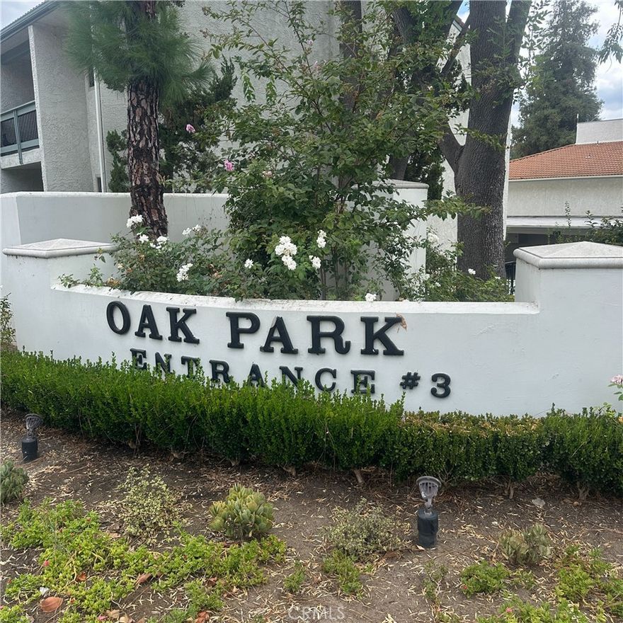 Welcome to this beautiful location in  Calabasas , first-floor condo in the highly desirable Oak Park Calabasas community. Freshly painted throughout and featuring newer laminate flooring, this home offers a modern and inviting feel. Both bathrooms are equipped with brand-new vanities, and the kitchen has been beautifully remodeled with custom cabinetry and stunning granite counter tops. A double stainless-steel sink and ample storage space make it both functional and stylish. The dining area boasts built-in cabinetry, while the spacious living room includes a sliding glass door that opens to a large patio, offering serene views of mature oak trees and a lush greenbelt. Recessed lighting with dimmer switches sets the perfect ambiance throughout. The master bathroom features a tiled shower, and the master bedroom includes a walk-in closet for added convenience. Inside the unit, you'll also find a washer and dryer conveniently tucked in a closet for easy access. The community has recently undergone significant upgrades, including new doors, signage, mailboxes, lighting, roofs, windows, and security cameras. Security guards are on-site for peace of mind, and there is a dedicated storage unit in the carport. On-site property management ensures everything runs smoothly. Enjoy access to the nearby lake just over the bridge, as well as guest parking, a gym, a clubhouse, and a heated pool and spa. A new bike storage area is available for residents, and on-site maintenance staff are always ready to assist. Several laundry rooms are located throughout the complex for your convenience. Ideally located near Trader Joe’s, dining, shopping, The Commons, and Bristol Farms, this condo is also a short drive from downtown Calabasas, where you can enjoy lively restaurants and live music. Award-winning LVUSD schools are within close reach, making this an ideal place for families. This is your chance to be part of the Oak Park Calabasas community, a unique neighborhood nestled among stunning oak trees, walking paths, and a peaceful creek. Two parking spots are available in the carport.