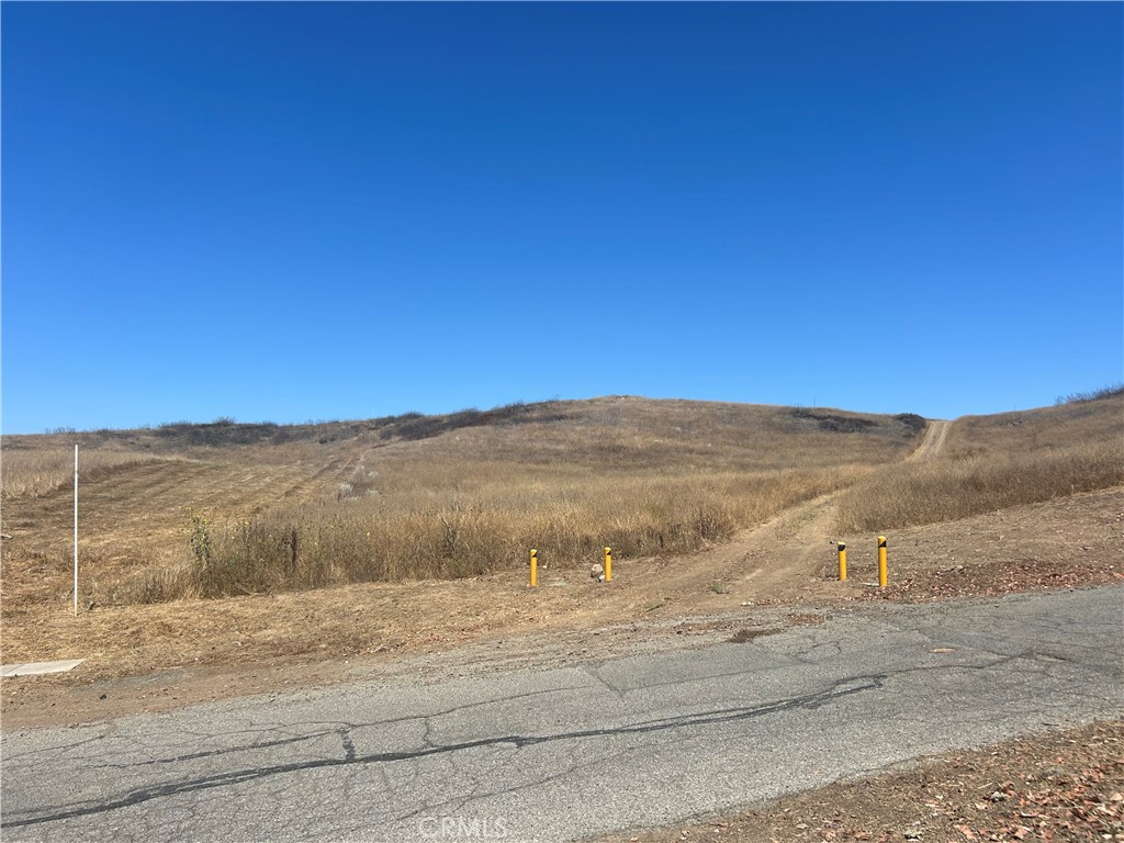 Inspiring 10.21 acre estate lot with paved roads, water, underground power, phone, internet, roughly graded driveway and house pad; all curbside and ready for your custom home in this coveted 10 acre minimum equestrian community of Santa Rosa West, in the La Cresta area of Murrieta – Fire hydrant across the street.
Just minutes away to restaurants, grocery stores, hospitals, schools, Temecula wineries, and other resources; you can enjoy nature’s serenity and amazing views on this gently rolling lot, within 1.5 hour drive to San Diego, Orange County, Riverside, and Los Angeles.
With multiple miles of dedicated equestrian trails, in USDA (Grow) Hardiness Zones ranging from 9a, 10a, and 10b, you can put your green thumb to work in your own garden &/or grove, or just enjoy the view in admiring your neighbors’ agricultural and equestrian efforts.
Come enjoy the view, hear the nature, and smell the fresh air for yourself on this AMAZING slice of heaven, waiting for you to call it home.
LAND LENDER REFERRALS AVAILABLE.