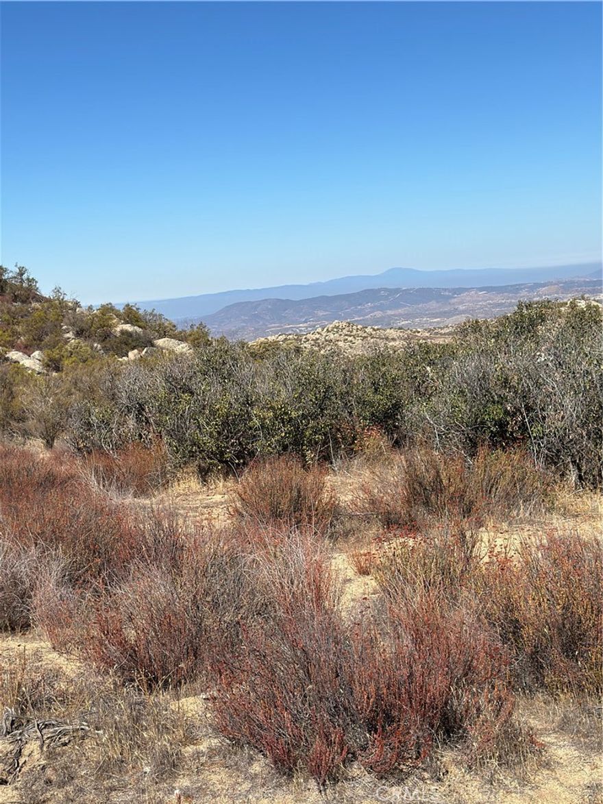 Gentle rolling to hilly 17.55 acres, has amazing views of the entire valley, perfect for custom/manufactured home with airplane views power & phone in Sorensen Road & Ruben Drive. Close to Cahuilla Casino for adult entertainment, short distance to Pechanga Casino, Pala Casino or SSoboba Casino, also close to Diamond Valley Lake, Lake Skinner, Vail Lake, or visit Temecula Valley Vineyards & wineries.