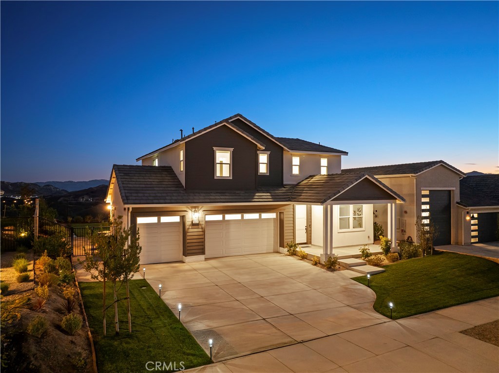 Panoramic Park & Mountain Views | Flat Backyard | Solar | Gated Williams Ranch | Covered by Both William S. Hart Union & Castaic Union School Districts
Located on a premium elevated lot in gated Williams Ranch, this north-east facing 4-bedroom, 3-bathroom, 3-car garage home offers a fully flat backyard with panoramic, unobstructed views of mountains, orchards, vineyards, and the County Park below—with no rear neighbors. The home sits several stories above park level, creating exceptional privacy and openness.
Designed with an open-concept modern layout, the kitchen, dining, and family areas flow seamlessly to the backyard. Two sliding glass doors open to the yard—one standard in the kitchen and a builder-upgraded second door in the family room. A full bedroom and bathroom on the main level make it ideal for guests, extended family, or a home office. The spacious backyard offers ample room for a future pool, guest casita, or RV parking.
Inside, enjoy fully paid solar, AI appliances, and smart tech features throughout—all designed for comfort and efficiency.
Key Highlights:
Builder 3-10 structural warranty (~8 years remaining)
Near I-5, shopping, and top-rated schools
Dimmable recessed lighting, smart switches, moisture/rain sensors
Remote hot water recirculation, soft-close cabinetry
AI-enabled washer/dryer, 2 refrigerators
85” + 55” Smart TVs
Pre-installed Ring video doorbell
Gated community with clubhouse, pool, spa, amphitheater, winery, orchards, paseos, and parks
Schedule your private showing today.