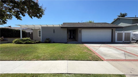 Photo of 9142 Brabham DR, Huntington Beach, CA 92646 (MLS # OC26192929)