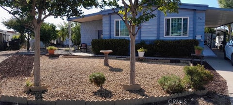 Photo of 26031 Kentia Palm DR, Homeland, CA 92548 (MLS # OC26173911)