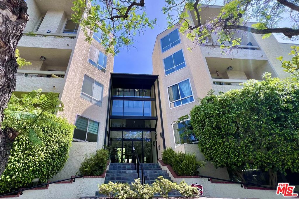 Nestled in the vibrant heart of Norma Triangle, this complex offers prime West Hollywood living. Enjoy easy access to Sunset Strip's clubs and the Pacific Design Center. Walk to West Hollywood Park, restaurants, bars, grocery stores. Inside of this recently renovated one-level unit, find a spacious living room with a wet bar area, open kitchen, large balcony facing green belt. Two bedrooms feature laminate flooring, with a master boasting a walk-in closet and bubble jet bath tub. In-unit laundry with built-in shelves and washer and dryer. The kitchen features refrigerator, dishwasher, and range/oven with ventilation hood, catering to your culinary endeavors with ease. Laundry is inside and community facilities. HOA covers hot & cold water, central A/C system, building maintenance, pool, trash, etc. Parking offers two side-by-side spaces in the gated underground garage, accessible via elevator from the elegant lobby, complete with surveillance cameras for peace of mind. Nearby schools and no-smoking policy insuring a pristine environment for all residents.