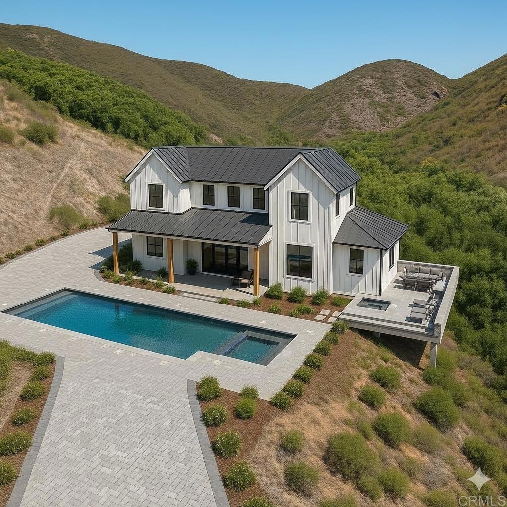 Welcome to the prestigious De Luz Community—an exclusive sanctuary for your dream estate, where serenity, refined living, and the beauty of nature come together. Just 20 minutes from Temecula, this remarkable nearly 10-acre parcel offers endless potential and a rare opportunity to secure one of the area’s most desirable properties. A gently graded flat acre provides the perfect canvas for your future home, whether a contemporary architectural masterpiece, a serene ranch-style retreat, or an equestrian estate. Nestled beside the 9,000-acre Santa Rosa Plateau Ecological Reserve, you’ll be surrounded by sweeping mountain views, a seasonal creek, and vibrant natural surroundings. Nearby, multi-million-dollar estates set the tone for the community. This property includes over $53,000 in water rights (one-time fee paid), up to a 2” water connection, electrical access at the frontage, and paved road access. Minutes from CrossCreek Golf Club, designed by Arthur Hills, it offers both seclusion and lasting value.