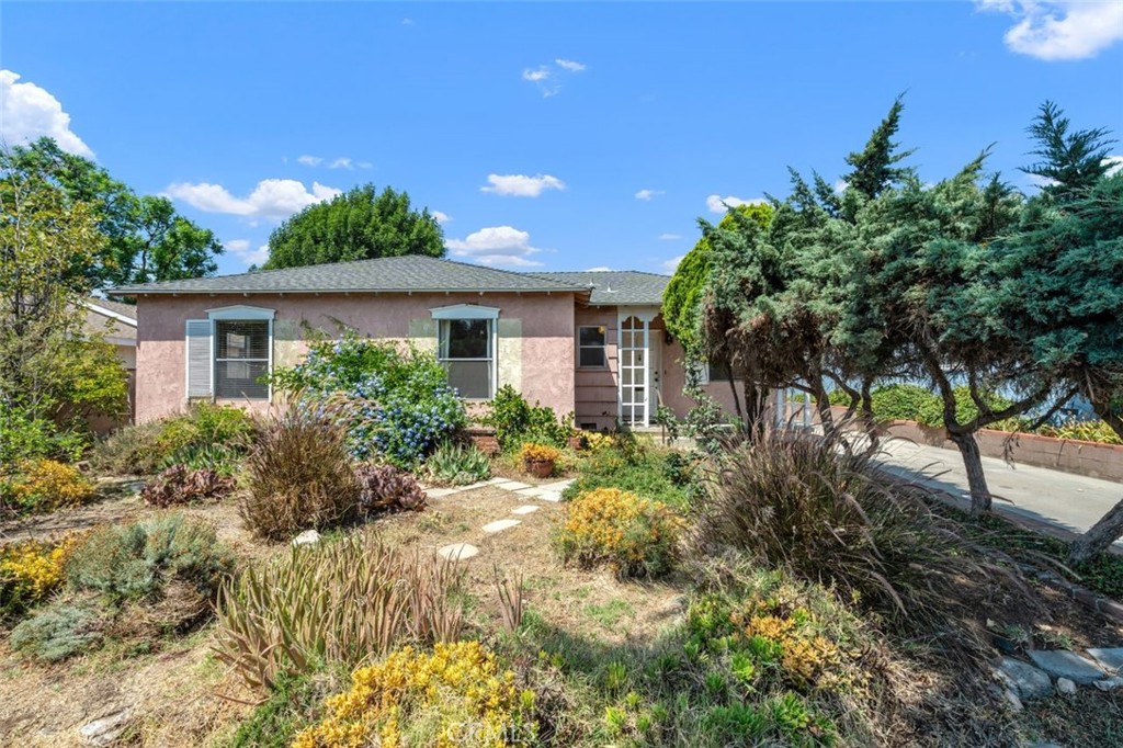Calling All Investors! This Single-Level 3-bedroom, 2-bath Pool Home with a Detached 4-Car Tandem Garage and a Newer Roof is the perfect opportunity for a flipper, builder, or buyer ready to unlock its potential in quiet residential pocket of Mission Hills. Situated on a spacious lot, with a west facing backyard, this property offers room for future expansion, possible ADU addition, or complete renovation. Inside, you'll find an inviting layout featuring a bright living room with a large glass slider leading to a covered patio, hardwood floors, and Central Air Conditioning. The sparkling pool and large backyard set the stage for creating an entertainer’s paradise. The oversized detached garage is ideal for a workshop, storage, or conversion. Whether you’re looking to renovate and resell or create your dream home, this is a rare find with endless possibilities. Located just minutes from schools, parks, shopping, and freeway access.