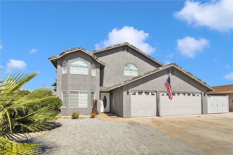 Photo of 13046 Bermuda Dunes Rd, Victorville, CA 92395 (MLS # HD26077035)