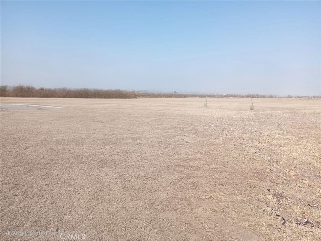 Sizeable lot in Rosamond waiting for an owner to build. May do well as a solar farm, as others are nearby.
