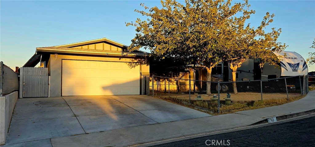 Located in the heart of Barstow, this 4-bedroom, 2-bath home offers both comfort and convenience, with schools, shopping, and freeway access just minutes away. Situated on a cul-de-sac, the property welcomes you with a charming covered front patio shaded by a mature tree and a fully fenced yard with a drive-through gate—perfect for easy RV access. Inside, you’ll find updated windows, doors, closet doors, and custom window blinds. The kitchen features custom cabinetry, built in microwave, plenty of countertop space , while the dining area opens to the backyard through a set of updated doors. Both the front and backyards are fenced, with the backyard offering a covered patio, storage shed, and a separate enclosed space for pets. The oversized primary suite includes a spacious bathroom, which includes a garden tub, right off the primary bathroom there is a laundry room for added convenience , which has plenty of storage . A second laundry connection is available in the garage. The oversized two-car garage also features extensive built-in cabinetry. This home combines functionality with thoughtful updates, making it a great opportunity in a central Barstow location.