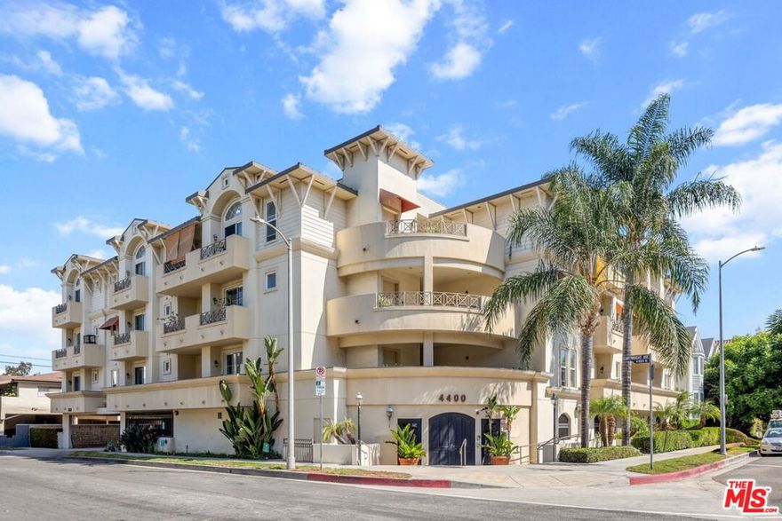 A stylish corner-unit retreat in the heart of Toluca Lake, this residence at 4400 Cartwright Avenue #102 seamlessly blends modern sophistication with timeless design. Bright, sun-filled interiors flow from the open living area with a sculptural fireplace to the kitchen, complete with granite countertops and a breakfast bar that connects to the living and dining spaces. A private balcony extends off the living room, perfect for relaxing or entertaining. The home offers two generously sized bedrooms, including a primary suite with double closets and a spa-like en-suite bathroom. Additional highlights include in-unit laundry, secured tandem parking, and a private storage unit in the garage. Residents enjoy community amenities such as a fitness center, security cameras in the lobby and garage, and secure parking. Ideally located near Toluca Lake's finest dining, boutiques, farmers' market, and vibrant destinations including Ventura Blvd, Tujunga Village, Disney, Warner Bros., NBC Universal, Universal Studios, and the NoHo Arts District with convenient access to the 101, 170, and 134 freeways.