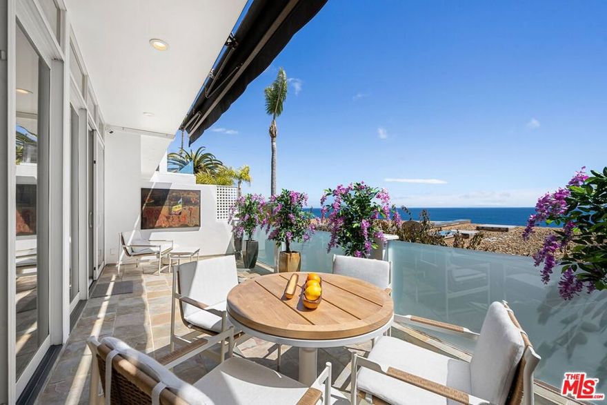 Beautiful bluff two-story Richard Neutra designed living space overlooking Escondido Beach.   Enjoy panoramic ocean views from two of three balcony areas.   Upstairs primary boasts a walk-in closet and covered balcony while the 2nd bedroom could be used as an additional office with its balcony.   Enjoy the water and sun from this mid-century inspired condominium in the private and secluded Holiday House.   With a private path to Geoffrey's and the beach, what else do you need?  Offered furnished or unfurnished.   Lease amount for summer/short term to be $22,000/Month.