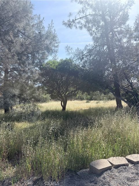 Photo of 19303 Ravenhill RD, Hidden Valley Lake, CA 95467 (MLS # LC26101814)