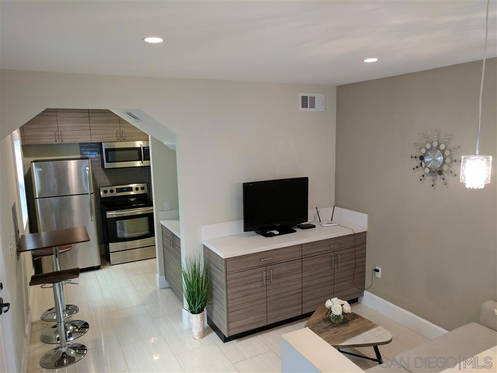 Built in 2015, this exquisite luxury residence on 9th Avenue offers discerning renters a refined home in one of San Diego’s most coveted neighborhoods. Step into a spacious bedroom designed with generous closet space and a walk-in finished storage area, tailored for your lifestyle and belongings. Unlike large impersonal complexes with long elevator waits and cookie-cutter layouts, this is a meticulously crafted, multi-million-dollar custom home that stands apart in quality and design. Featuring award-winning full-size Samsung washer and dryer, designer plank flooring, luxury porcelain tile, quartz countertops, tankless water heater, forced air AC/heat, and premium Hansgrohe and Altman fixtures complemented by bespoke GMJ cabinetry — every detail speaks to superior craftsmanship and style. Invite guests with confidence and savor the comfort of a home that reflects your ambition and taste. Located mere minutes on foot from Downtown’s finest attractions — the Marina, Seaport Village, Petco Park, Balboa Park, Little Italy, and the Gaslamp District — your lifestyle here is unmatched. Isn’t it time your home matched your sophistication, ambition, and style?