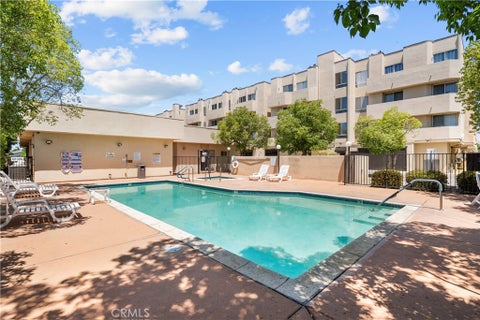 Photo of 19350 Sherman Way Way #328, Reseda, CA 91335 (MLS # SR26132992)