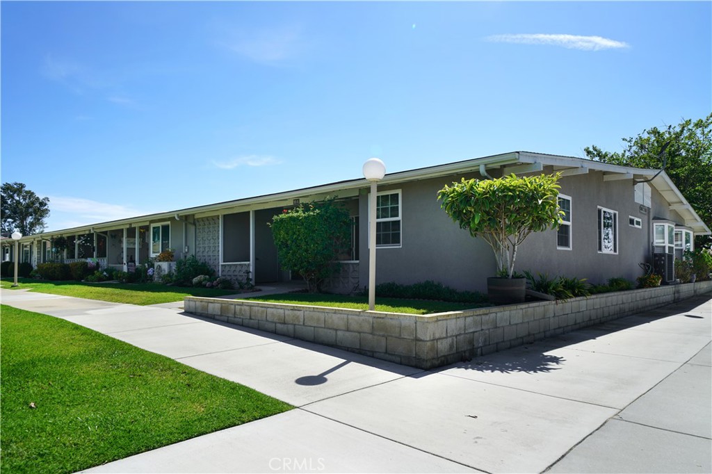 EXPANDED MUTUAL 1 CORNER UNIT - It's the one you've been waiting for! This expanded, 2BR/2BA home also boasts a separate dining room - a Leisure World rarity! The added bed, bath and dining rooms feature dual-pane/vinyl-frame windows, smooth ceilings and raised-panel interior doors. Additionally included are INSIDE LAUNDRY, two skylights, three ceiling fans and an enclosed storage area at the south end of the patio (as well as the carport). (Parking is provided at Carport 14, #07.) You'll love its ideal location facing a scenic, sprawling greenbelt, and adjacent Downtown Leisure World - enjoy quick & easy access to the golf course, therapeutic swim pools, health care center, administration building, amphitheater, community facilities and more. If you're considering Leisure World, this one's a must-see!