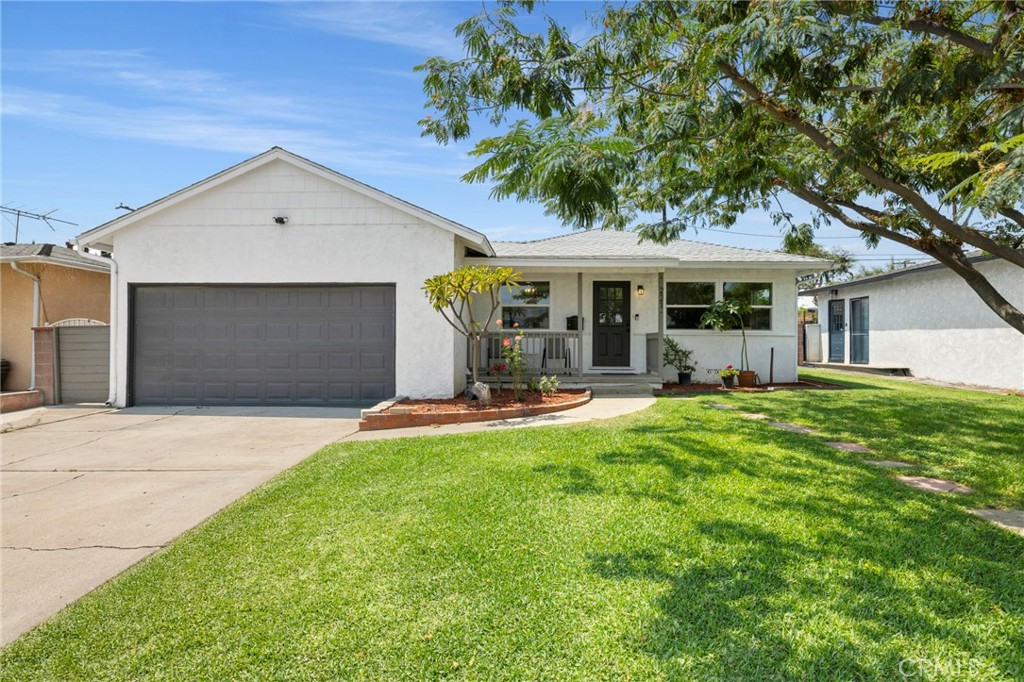 Beautifully updated 4-bedroom home with a private guest suite, bonus flex space, and a backyard built for entertaining—this La Habra beauty has it all! This light-filled residence features an open floor plan with fresh interior paint and laminate flooring throughout the main living areas. The remodeled kitchen offers quartz countertops, stainless steel appliances, modern light fixtures, and white shaker-style cabinets. Both bathrooms have been tastefully updated with contemporary vanities, fixtures, and premium flooring. In addition to the main home, a detached structure provides a private bedroom and full bathroom—perfect for guests, extended family, or rental income. A separate storage/flex structure offers endless possibilities for a home office, creative studio, gym, or entertainment space. The spacious backyard boasts plenty of room for outdoor entertaining, play, or future customization.