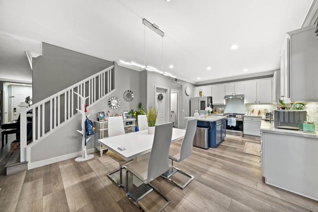 Come home to sunsets and privacy in Eastlake Vistas! From the primary bedroom balcony, you’ll enjoy sunset views to the west. Inside, this thoughtfully designed residence offers an open layout with upgraded flooring, a modern kitchen featuring quartz counters, and a center island perfect for casual dining or entertaining. The low-maintenance backyard provides just the right amount of space for gatherings, with the added benefit of being elevated above your rear neighbor—ensuring privacy throughout your home. As a resident of Eastlake Vistas, you’ll have access to two community clubhouses, including the Eastlake Woods Clubhouse, along with scenic parks, hiking trails, pools, and top-rated schools. Just a short walk away, Mountain Hawk Park at Sweetwater Reservoir invites you to explore nature and outdoor recreation. Known for its serene tree-lined streets and welcoming atmosphere, Eastlake Vistas is part of the larger Eastlake master-planned community—a picturesque enclave that perfectly balances tranquility with convenience.