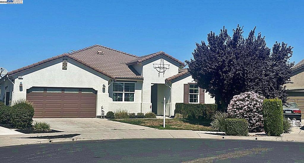 Welcome to 917 Talaria Court in Oakley’s coveted Summer Lake community. This Charming 4 Beds, 3 Baths Home, a rare single-story gem on an oversized 11,839 sq. ft. nestled in a quiet cul-de-sac! This 4-bedroom, 3-bath, 2,590 sq. ft. home showcases an open, light-filled floor plan with a formal living and dining room, fresh interior paint, tile, and newer carpet, dual-pane windows, double-panel doors, and a fully paid 17-panel solar system. The gourmet kitchen features an oversized granite island with sink and breakfast bar, stainless steel appliances including gas stove and double ovens, custom cabinetry with pull-out drawers, stylish backsplash, pendant lighting, recessed lights, and a walk-in pantry—all flowing seamlessly into the inviting living room. The primary suite features dual vanities, a soaking tub, a glass shower, and an expansive walk-in closet. The private backyard, complete with a California patio and lemon trees, is ideal for entertaining. Enjoy resort-style amenities including a pool, tennis courts, playgrounds, recreation center, and lakeside activities— A Summer Lake Gem!
