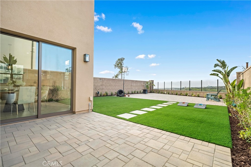 VIEW !!VIEW!! VIEW !! Welcome to your VIEW dream home that's very rare in an amazing neighborhood! This stunning view house Located on a desirable corner lot, you’ll enjoy a big backyard, paid off solar panels, ideal for relaxing, playing, or hosting summer barbecues parties with your loved one. With breathtaking mountain views to the right side and sparkling city views to the left side, this home offers a perfect blend of nature and urban life. You can always get the views from all of the corners of the house! Get ready to make unforgettable memories in this beautiful space!
Boast four spacious bedrooms and four bright bathrooms, perfect for a growing family. As you step inside, the high ceilings create a sense of openness, making the living space feel even larger. As you enter, you’re greeted by a spacious open-concept layout seamlessly blends the living and dining areas. The kitchen features upgraded cabinets that stretch all the way to the ceiling, The elegant kitchen island is perfect for meal prep or casual gatherings, making it the ideal spot for family and friends to congregate.
Throughout the first floor, you'll notice the upgraded flooring throughout the home. The second floor of the house is thoughtfully designed to maximize both comfort and functionality. On one side of the hallway are two well-sized bedrooms, each featuring its own private bathroom. These rooms all offering a pleasing balcony view that invites natural light and fresh air, ideal for enjoying morning coffee or unwinding in the evening. You can enjoy the city view from one of the guest bedrooms and through the hallway.
At the end of the hallway, the master bedroom stands out with its generous dimensions and fantastic views of sparkling city and peaceful mountain view . The backyard is nothing short of a paradise, offering a huge area that feels like an extension of the home itself. You can enjoy the peaceful and joyful life in the fantastic view backyard .
This remarkable house locate in the best point in the community. Walk distance to the Loma Ridge elementary school and community center with minutes away , suit in the middle of the parks surrounded with facilities such as Pickleball courts, Swimming pools, Tennis court , Barbecues , Golf practice and all kinds of Playground. Awarding Portola high school and shopping center , great park facilities in minutes drive distance, You never want to lose this rare chance for your dream house !