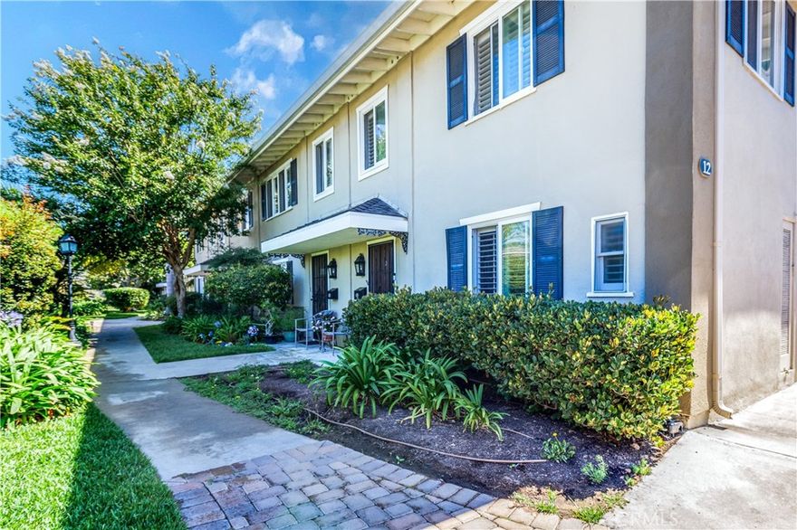 Enjoy this beautifully upgraded unit only a few short blocks to the beach!  Enter through the beautiful lush green space to the back of the complex to unit 12D.  There is a spacious living area that opens to your private courtyard and outdoor space.  Off the courtyard is your private laundry room.  The kitchen has upgraded granite counters and plenty of storage space.  There is a roomy downstairs bed and bath for your convenience.  Upstairs is a large guest room and beautiful primary suite with private dressing room and newly renovated bath.  Directly adjacent to the unit is a convenient detached 2 car garage.  Want to bring your pet, just give us a call.  Perfectly located just a few short miles from the beach, the freeway, great shopping, and yummy restaurants.  This one will not last!