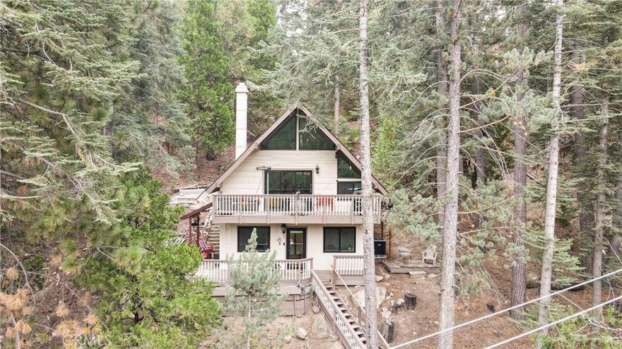 Welcome to the peace and quiet of Lake Arrowhead with this beautifully updated cabin nestled among the trees on Brentwood Drive. This cabin offers the perfect blend of mountain charm and modern upgrades — with ample space between neighbors and full lake rights. This fully furnished, turn-key cabin is the ideal escape for those seeking space, privacy, and access to all that Lake Arrowhead has to offer. ALA membership offers use of the lake, beach club, boating, parks, fishing and watercraft registration.



This spacious 3-bedroom 2-Bath layout is thoughtfully designed, with one bedroom on each level, providing both comfort and privacy for guests or family. 



The heart of the home is a recently remodeled kitchen, featuring live edge countertops, updated appliances, with lots of rustic features. Throughout the home, wood accents — from exposed beams and trim tie everything together. Bringing the outdoor elements inside. The HVAC system and water heater ensure comfort year-round. Stay warm during the snowy season with a cozy fireplace, perfect for winter days and nights. Plus, plowed and maintained roads ensure easy access year-round. 



Outdoor living is just as inviting with a step-out deck perfect for morning coffee among the pines, and a private patio area ideal for relaxing, dining, BBQ or gathering around a fire pit. 



Whether you're looking for a peaceful space, a rental-ready investment, or a full-time mountain home, 875 Brentwood Drive delivers on space, comfort, and that classic Lake Arrowhead lifestyle.