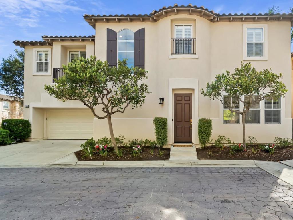 Tucked away in the quiet back corner of the gated San Raphael community, this detached, corner lot home offers the ideal blend of privacy, style, and convenience. Far from any road noise, here you will enjoy peace, quiet, and great coastal breezes. Around the corner from your front door, you will find access to expansive hiking trails with awe-inspiring ocean and canyon views. Inside, you will find a beautifully updated 3-bedroom plus loft, 2.5-bath home with a smart layout and modern finishes throughout. The open-concept main floor effortlessly blends the living and dining spaces into a low-maintenance backyard—perfect for morning coffee, weekend BBQs, or just relaxing in the sun. The updated kitchen features custom cabinetry and tile, modern, stainless-steel appliances and plenty of storage. Upstairs, the primary suite is spacious and bright, with two spacious walk-in closets and a modern bathroom with a soaking tub. Two more bedrooms and a loft offer flexible spaces for guests, kids, or a home office! San Raphael is a quiet, well-kept community with access to walking trails, landscaped green space and secure gated access for peace of mind. Nestled in the sought-after Torrey Hills neighborhood, you are surrounded by award-winning schools, Torrey Hills parks, green spaces, shopping and dining. With easy freeway access, you are minutes from Torrey Pines State Park and the beautiful beaches of Del Mar. If you are looking for a low-maintenance home that balances style with functionality and convenience, do not miss the opportunity to make this your new home in CV!