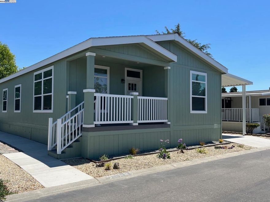 New 3 bedroom, 2 bath, manufactured home. Spacious living room with coffered ceiling, and recess can lites. Open kitchen with island, solid surface counters, and tile splash, New stainless steel appliances, refrigerator, gas stove, dishwasher and microwave. Primary bedroom with coffered ceiling, recess can lites.  Primary bath with tile shower, linen closet, dual sinks and solid surface counters.  Community is near shopping at Union Landing, freeway access, and more. Fireplaces: NO