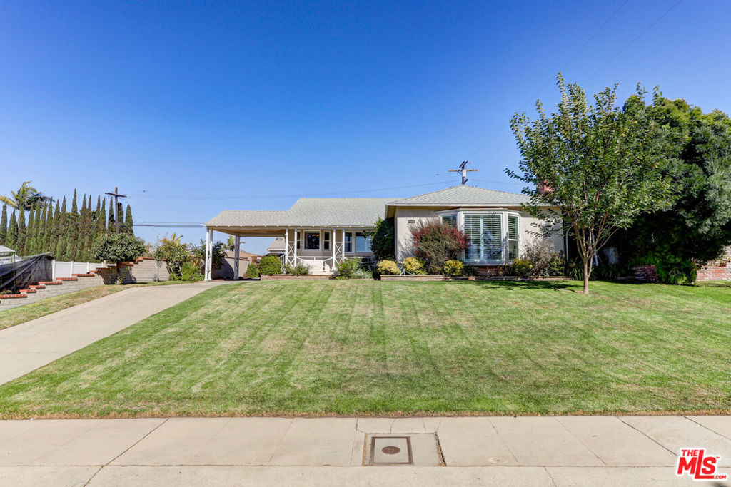 Nestled on a serene street in the desirable Kentwood neighborhood, this exceptional three bedroom, two-bath home with a one bedroom and one bath ADU presents a unique opportunity for discerning buyers. Perched high on a knoll, the residence commands splendid views and is set on an expansive 7,700-square-foot lot, offering abundant outdoor space for relaxation and entertainment. Upon entry, one is greeted by the light filled interior, featuring modern amenities and laminate floors throughout. The well-appointed kitchen boasts brand-new appliances. The spacious living areas provide a perfect setting for gatherings, while each bedroom has great space. Enhancing the property's appeal is a permitted Accessory Dwelling Unit (ADU), ideal for guests, extended family, or rental income potential. This invaluable addition opens a realm of possibilities, further elevating the appeal of this remarkable home. This residence is not merely a house; it is an invitation to a lifestyle of tranquility and sophistication in Kentwood. Seize this opportunity to make it yours today.
