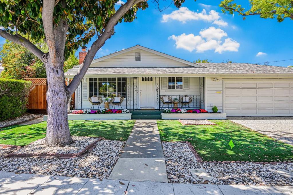 Welcome to this charming home located in the desirable Cuesta Park Neighborhood offering a comfortable lifestyle within a well located community. This residence boasts 3 bedrooms and 2 full bathrooms, including a primary with a stall shower and another with a shower over tub. The kitchen features quartz countertops, a hood over the range, gas oven range, and a refrigerator. Hardwood and vinyl/linoleum flooring flow throughout the home, enhancing its appeal. Central AC and forced air-gas heating ensure year-round comfort, complemented by double-pane windows for energy efficiency. Cozy up to the inviting fireplace during cooler nights. The laundry is conveniently located in the garage, complete with a washer and dryer. Situated within the Mountain View Whisman Elementary School District, this home offers practicality and style. Enjoy easy living in a sought-after area, with an array of amenities ensuring a perfect blend of convenience and comfort.