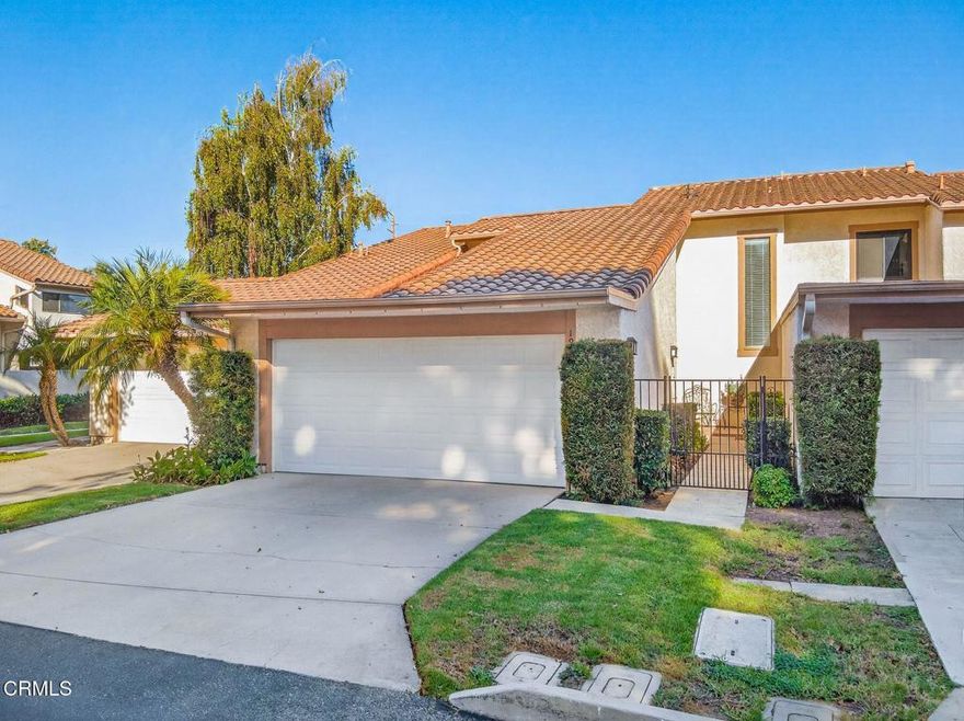 Beautifully Upgraded 3-Bedroom, 2-bath Town home in the desirable Shadow Mountain Tennis Club neighborhood. Nestled on a cul-de-sac in the scenic rolling hills of Newbury Park, this special 2-story home features a spacious primary bedroom suite conveniently located on the first floor and abundant closet space throughout. The lovely remodeled kitchen boasts premium finishes, including a Viking stainless steel stove & refrigerator, granite counter tops, built in dishwasher, custom cabinets with pull out drawers and a sunny breakfast nook to enjoy your morning coffee or tea! Step into the inviting living room with a cozy fireplace and enjoy seamless indoor-outdoor living with direct access to a private patio - perfect for entertaining, relaxing on your chase lounge chair, or enjoying fruit from your own Pomegranate or Cara Cara orange trees. There are two bedrooms and one full bath upstairs, one of the bedrooms has it's own balcony with east facing views. This home also includes a separate dining room, lots of natural light, high ceilings, dual pane windows, ceiling fans, plantation shutters, and an attached 2-car garage with attic storage space along with ample guest parking close by. Residents enjoy access to fantastic community amenities, including tennis courts, a sparkling outdoor pool, a clubhouse and peaceful walking paths. Ideally located near hiking trails, shopping, restaurants, Ragamuffin Coffee Roasters, Trader Joe's, Newbury Park High School, and more. This is California living at its best! These homes rarely come on the market, schedule your private showing today.