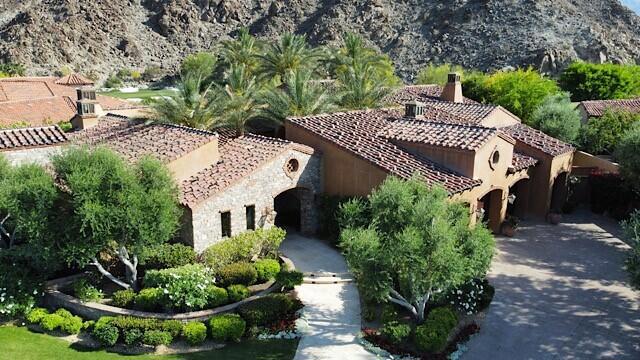 Stunning Tuscany style custom home at beautiful Tradition Golf Club. Long range views in multiple directions, with soaring ceilings and the finest in construction.